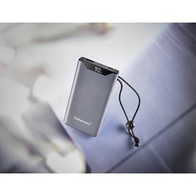 Portable power bank with digital display on a blurred blue background. Showing '90%'. Suitable for on-the-go use.