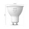 A Philips Hue White GU10 LED light bulb, 57 mm tall and 50 mm in diameter, suitable for smart lighting.