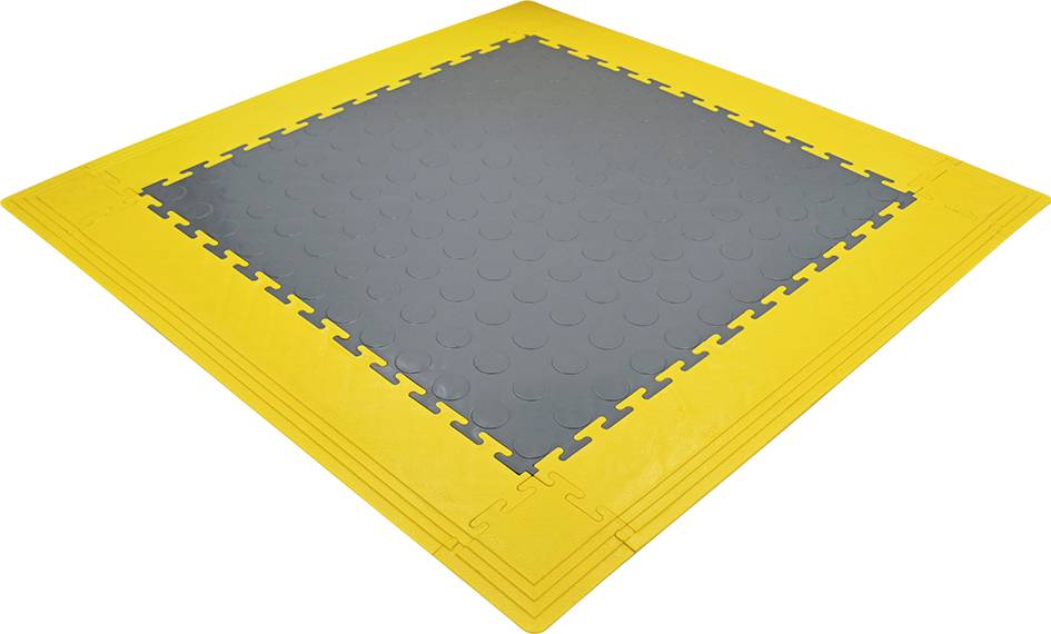 Yellow plastic ramp with a grey, textured, non-slip surface in the middle. Corners rounded.