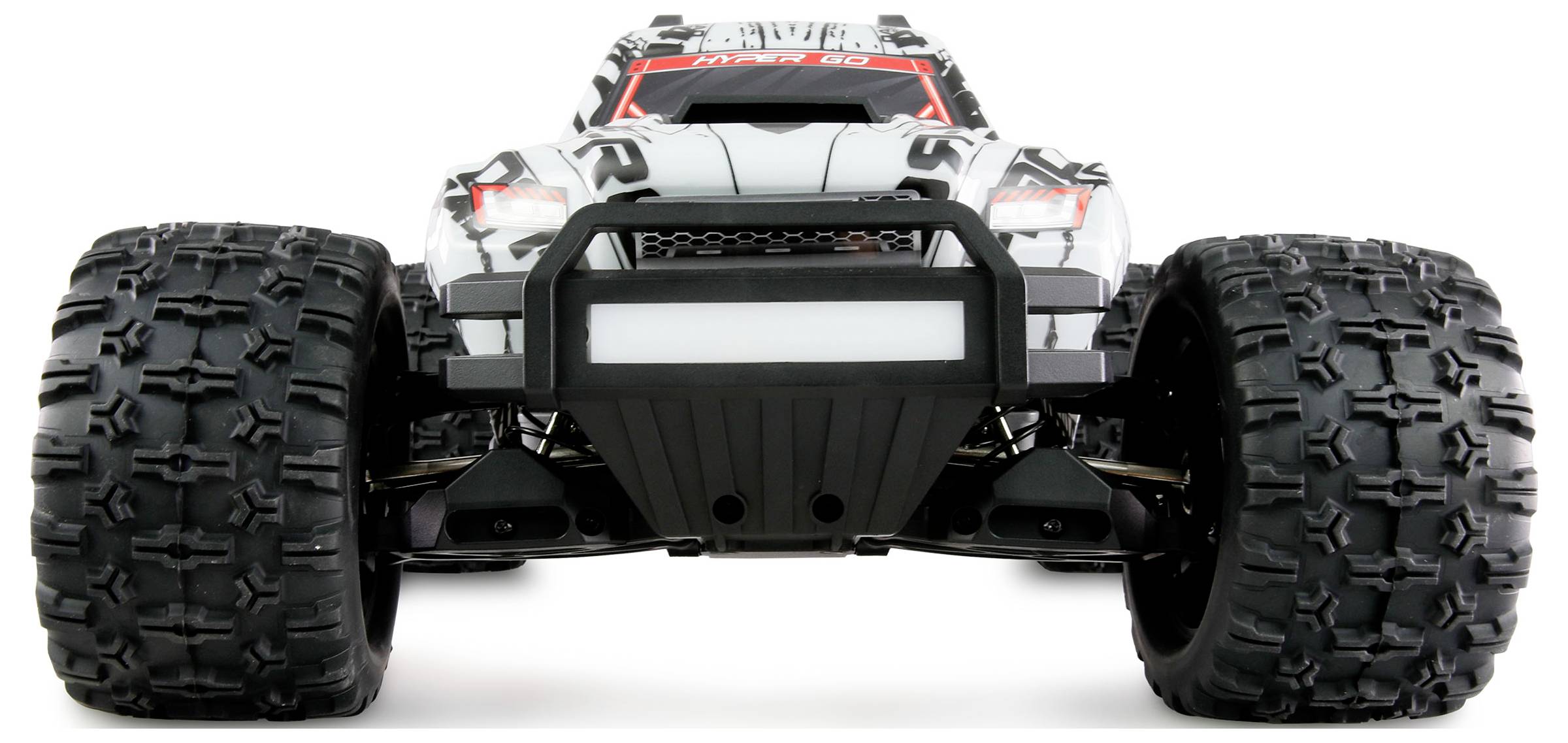 A remote-controlled monster truck-style car, photographed from the front, with large, treaded tyres and angular design.
