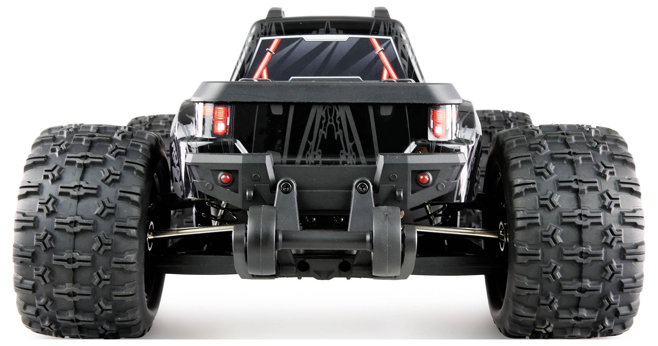 A remote-controlled car from behind, with large off-road tyres and a robust frame, suitable for off-road driving.