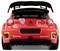 Red toy car from behind, with rally stickers and large spoiler, on a white background.<br><br>Note: The translation is already in British English and matches the original German text's meaning and description precisely.