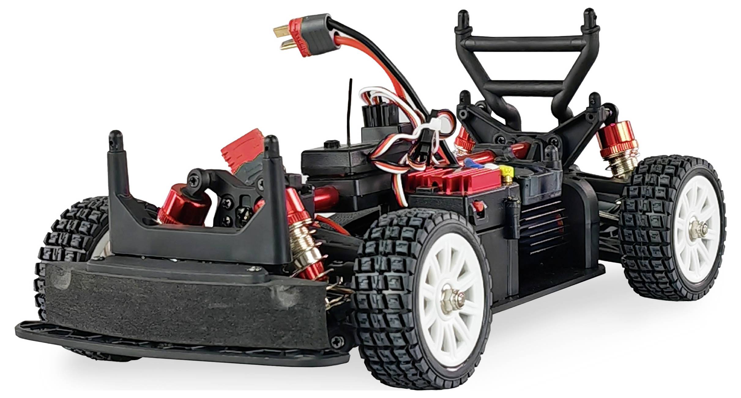 Remote-controlled car without bodywork, showing wheels, suspension, and internal electronics with cables and connectors.