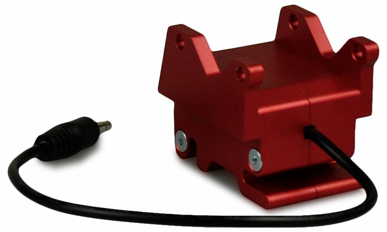 Red, rectangular metal detector with attached cable, suitable for technical or industrial applications.