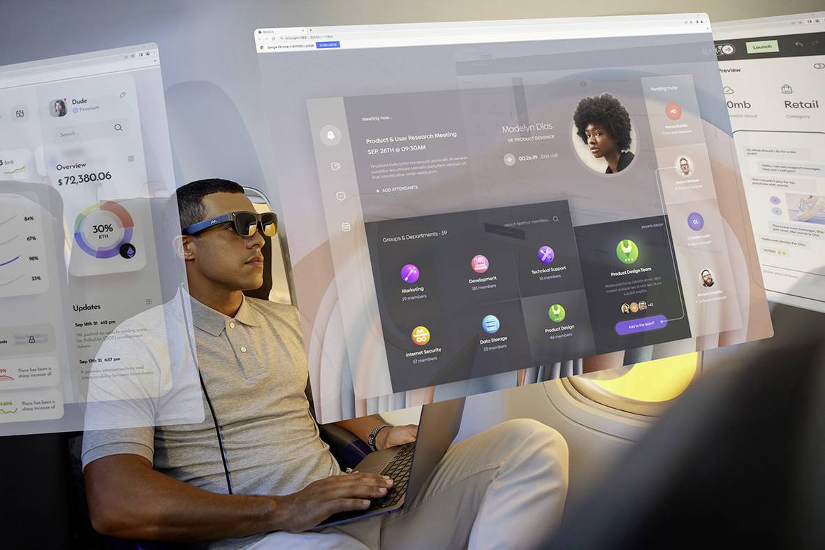 A man wearing sunglasses sits on a plane with a laptop. Various digital dashboards and graphics are overlaid, displaying data and user interfaces.