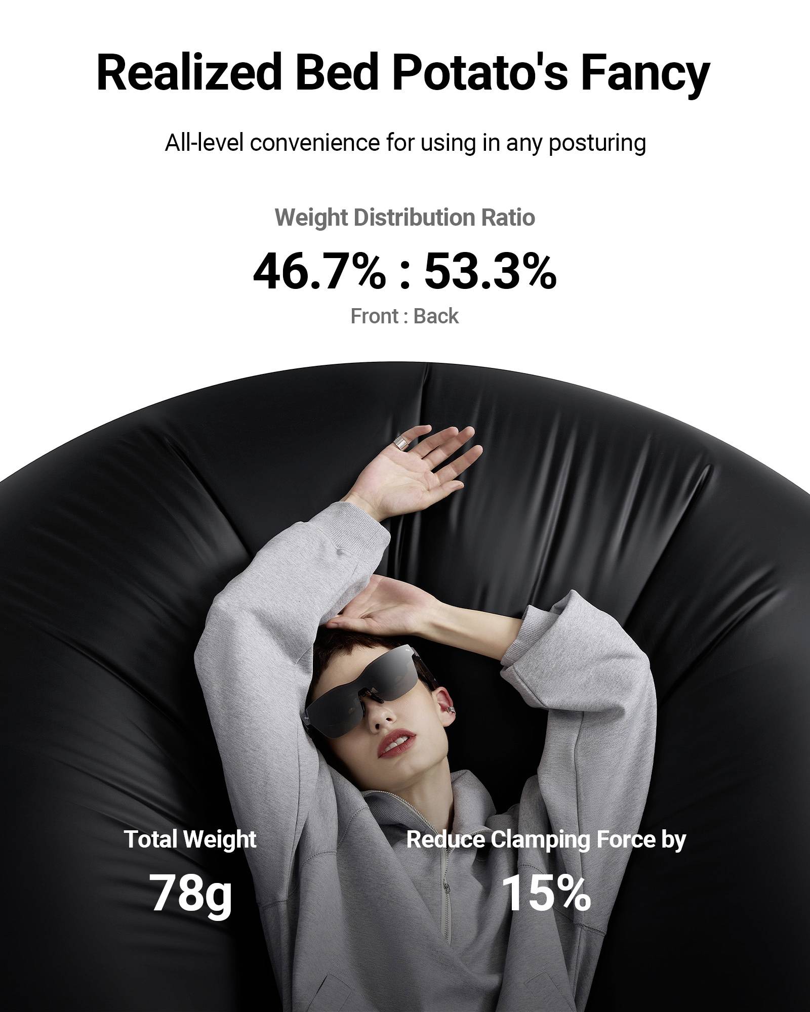 A person is relaxing on a black bean bag, wearing sunglasses and a grey top. Text: 'Weight distribution front/back: 46.7% / 53.3%'.