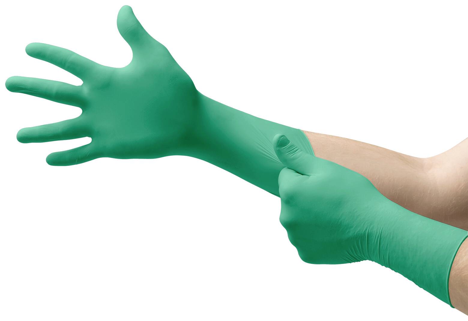 A hand pulls on a green disposable glove.