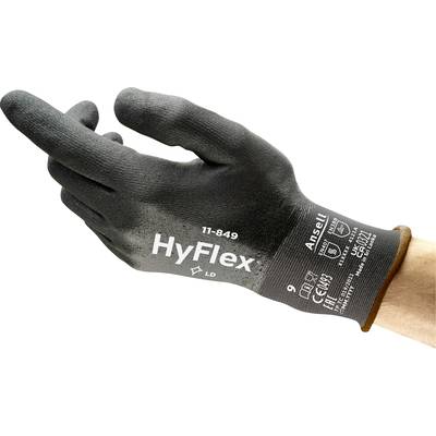 A black glove with the inscription 'HyFlex 11-849', worn on a hand, provides protection and flexibility for industrial work.