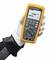 A gloved hand is holding a multimeter with a digital display. The display shows '1500 VDC'.