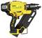 A yellow, electric nail gun with a black handle, brand and warning symbols visible on the device. Model suitable for heavy construction work.