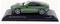 A model car of a green Aston Martin DB12 Coupe on a black base.