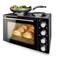 A combined cooker with hob plates. Bread rolls baking in the oven. A pan with vegetables sits on the hob plates. Ideal for multifunctional cooking.
