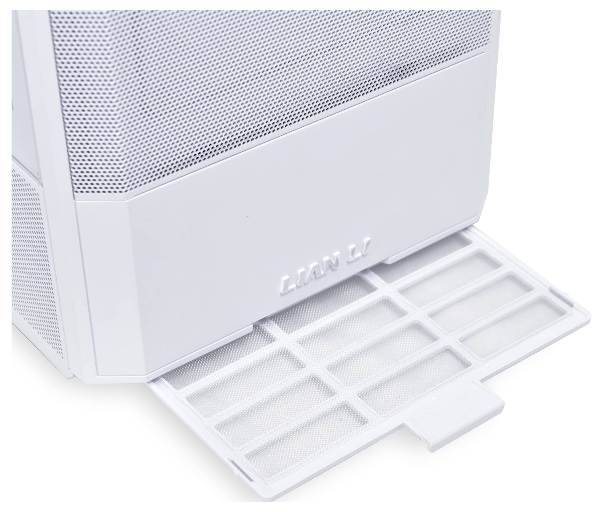 'Close-up of a white computer case with an open, removable dust filter at the bottom, which protects the interior from dust.'