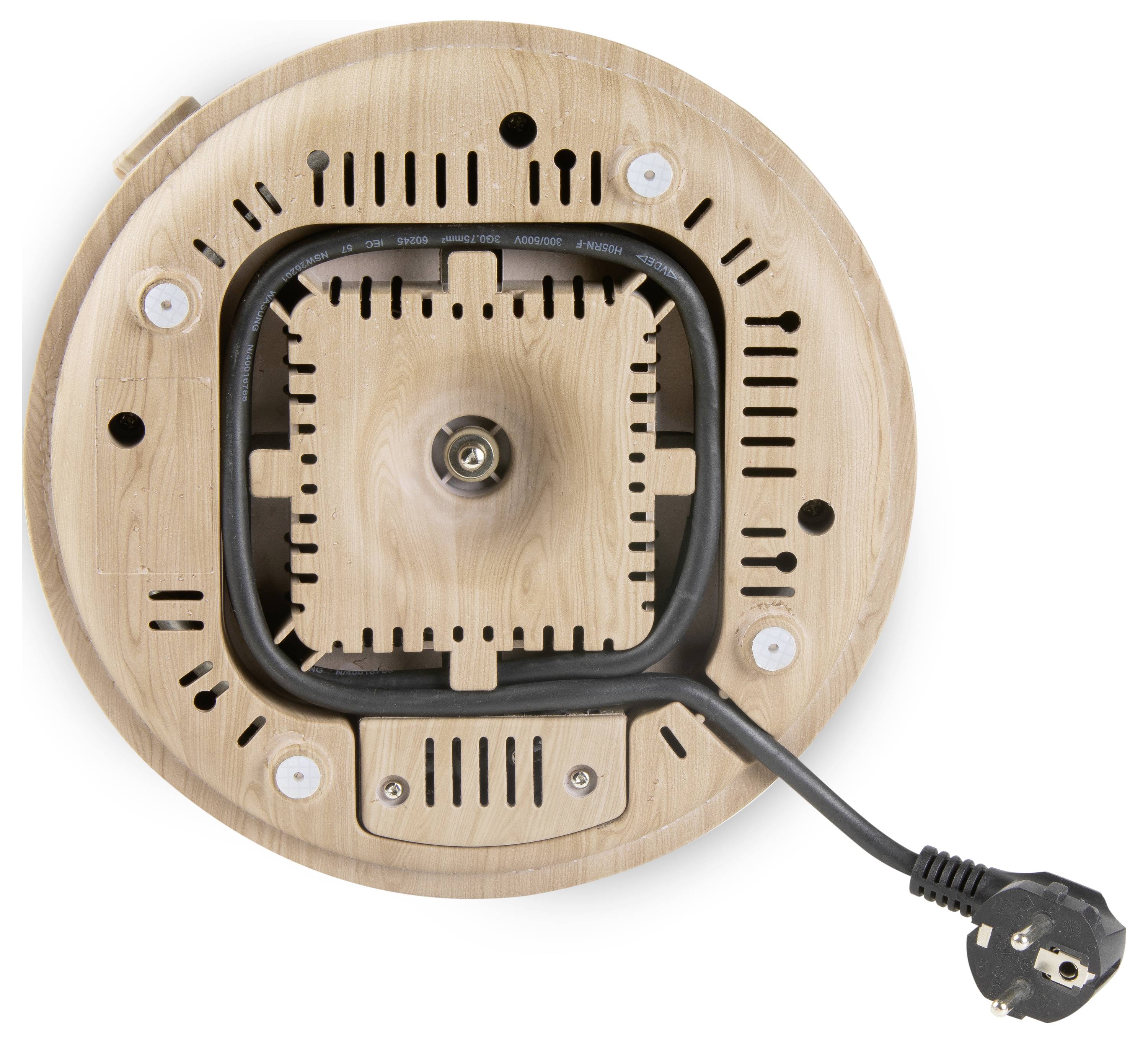 Wooden underside of an electrical device with a circular design, visible cable outlet, and plug.