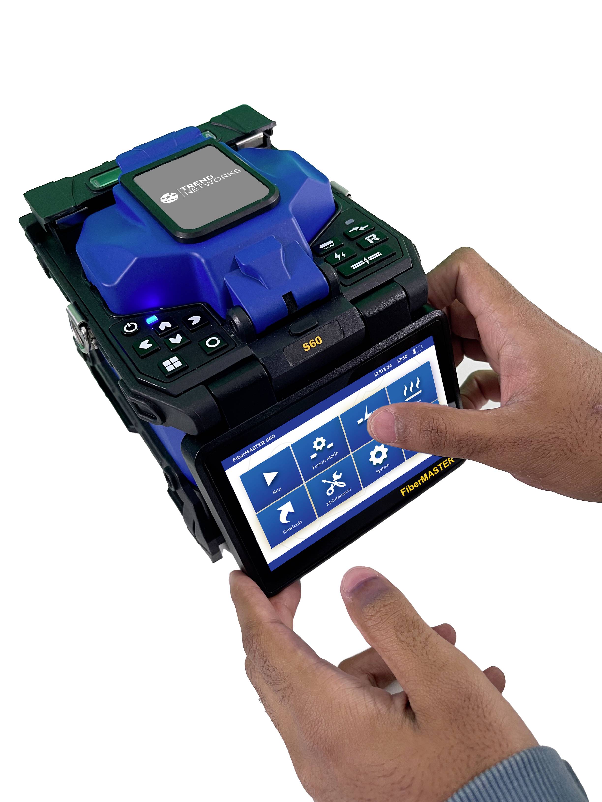 A person is operating a technical device with a screen displaying various symbols for different functions.