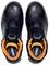 Black safety shoes with orange inner linings and fastening system.
