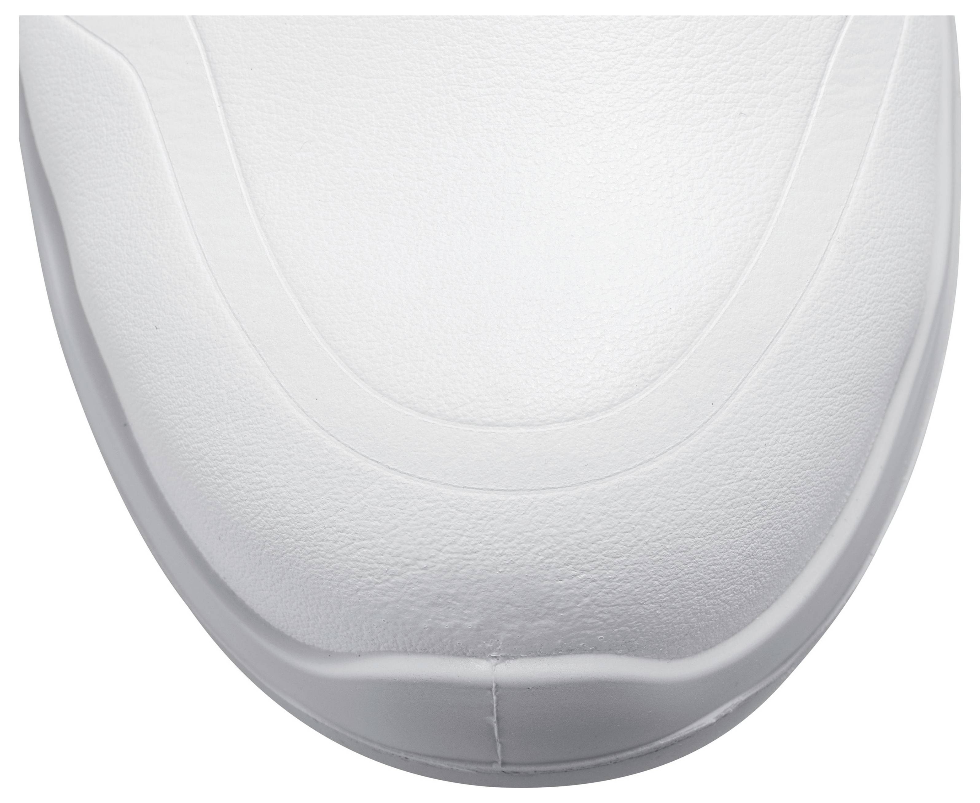 Close-up of a white leather shoe toe, curved stitching running along the contours. Minimalist design.