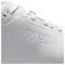 Close-up of a white trainer with the embossed "uvex" logo on the side.