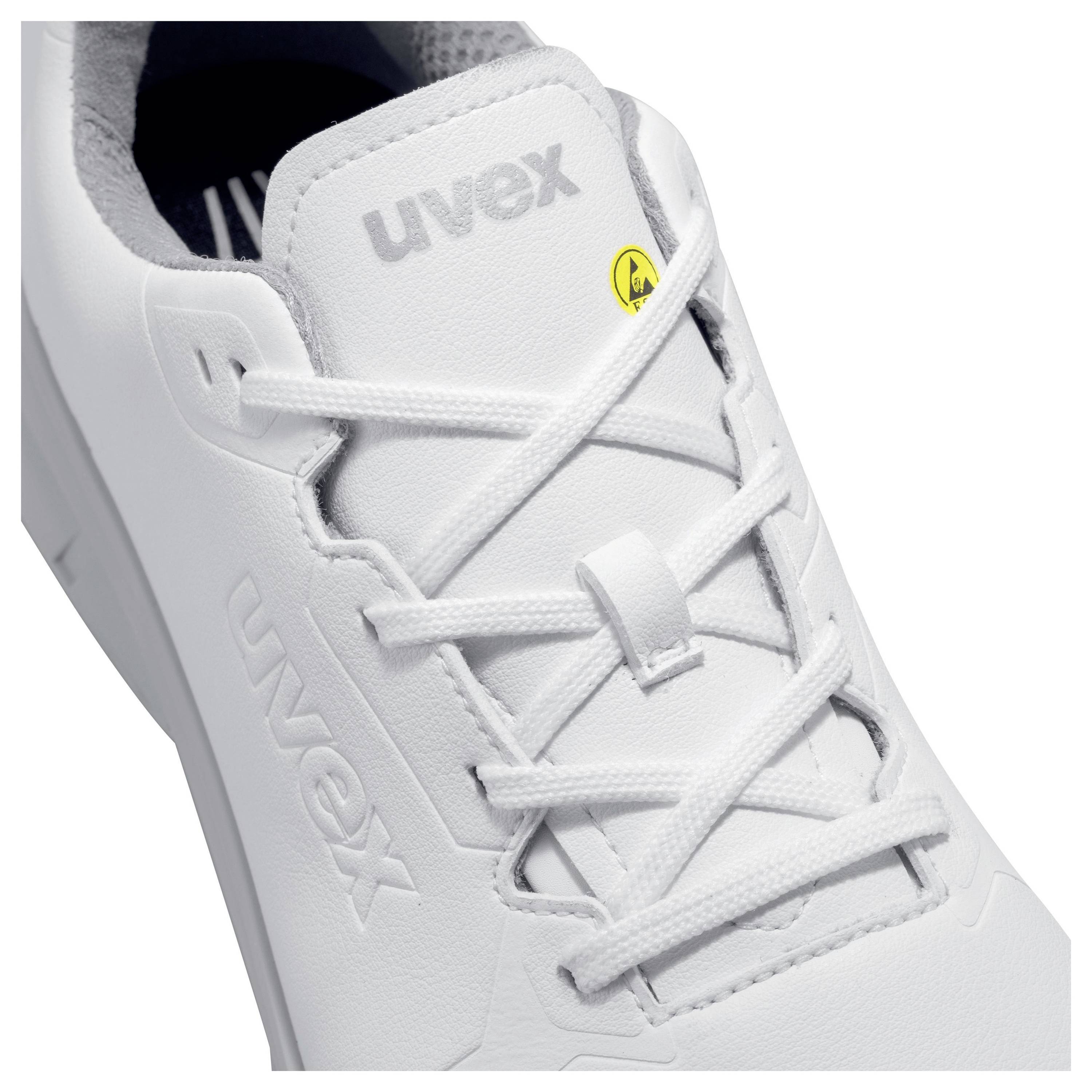 A white work shoe by uvex with safety features, such as a non-slip sole and impact protection, suitable for industrial use.