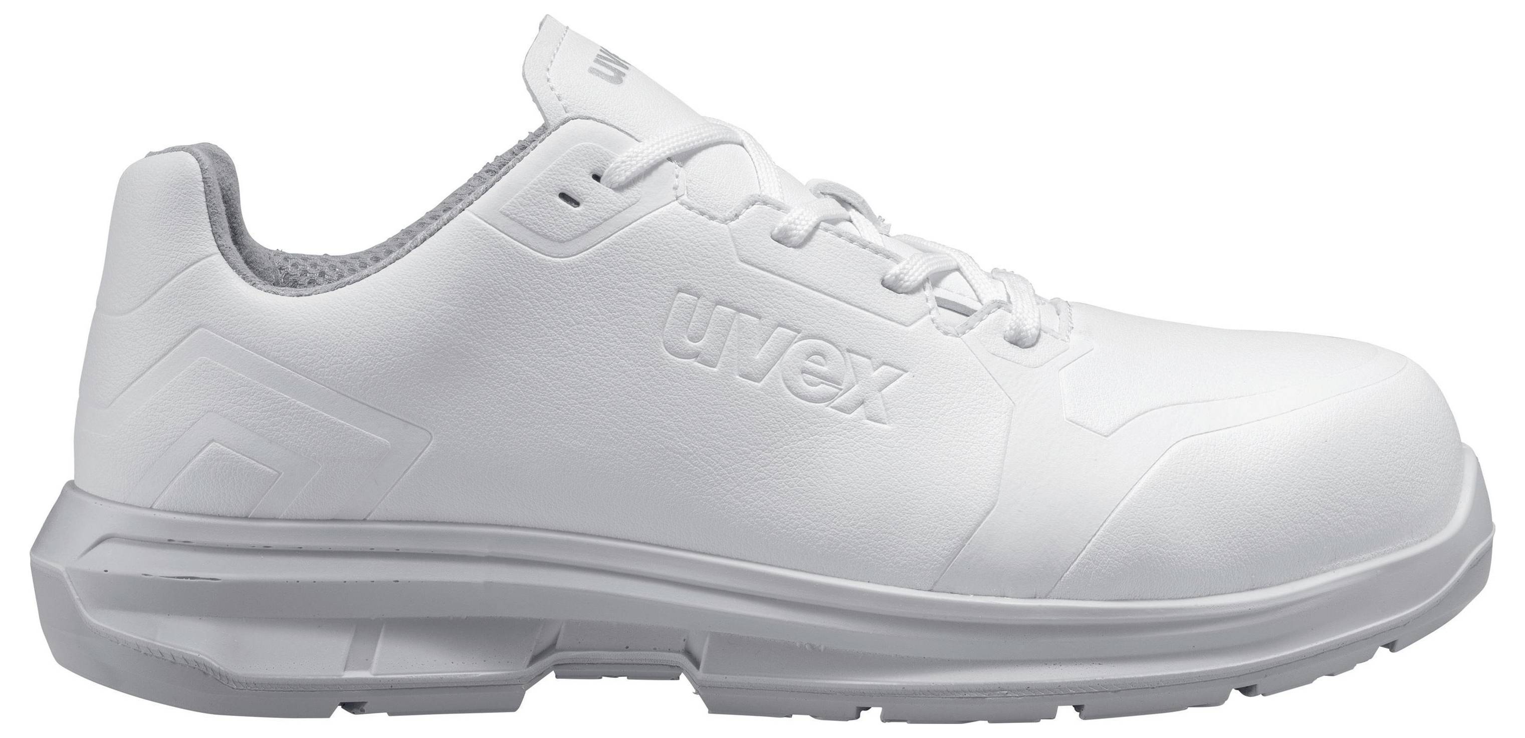 White safety shoe with grey sole, sporty design and brand logo.