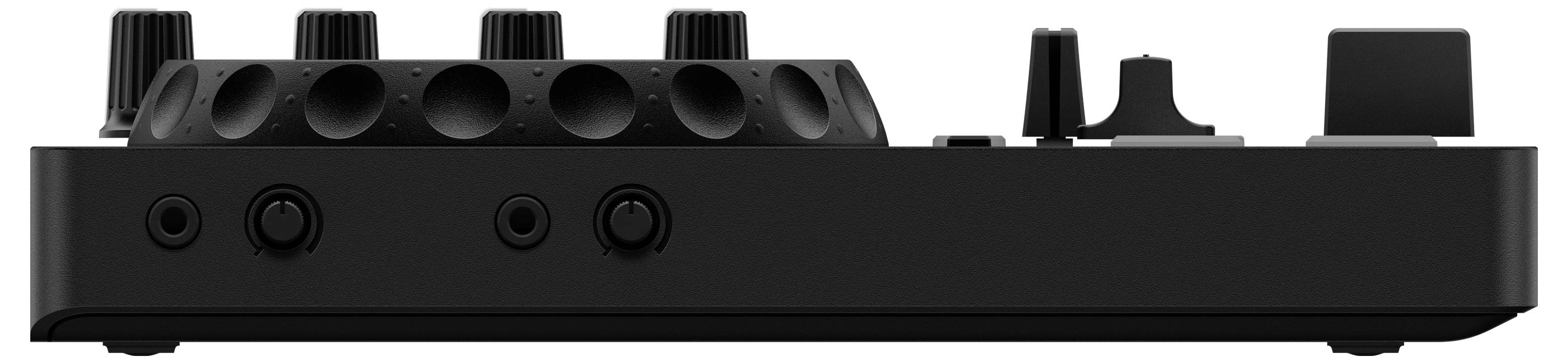 Black audio mixing desk in side view with multiple buttons and connections for sound control and connectivity.