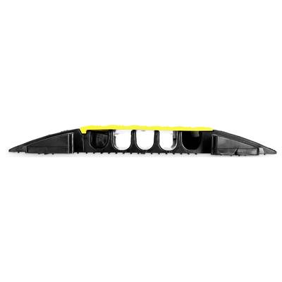 Black cable conduit with a yellow rubber lid in a semi-circular shape. Suitable for protecting cables on roads or in warehouses.