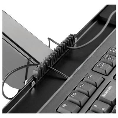 The keyboard cable is neatly routed through a plastic cable management device to prevent cable clutter.