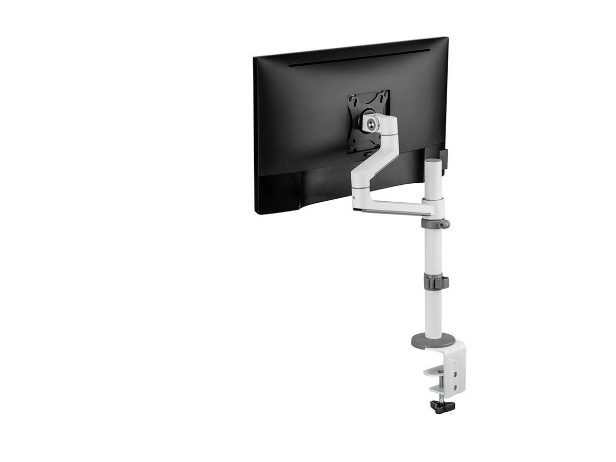 A height-adjustable monitor arm in silver and black is attached to a desk. The arm is supporting a large computer screen.