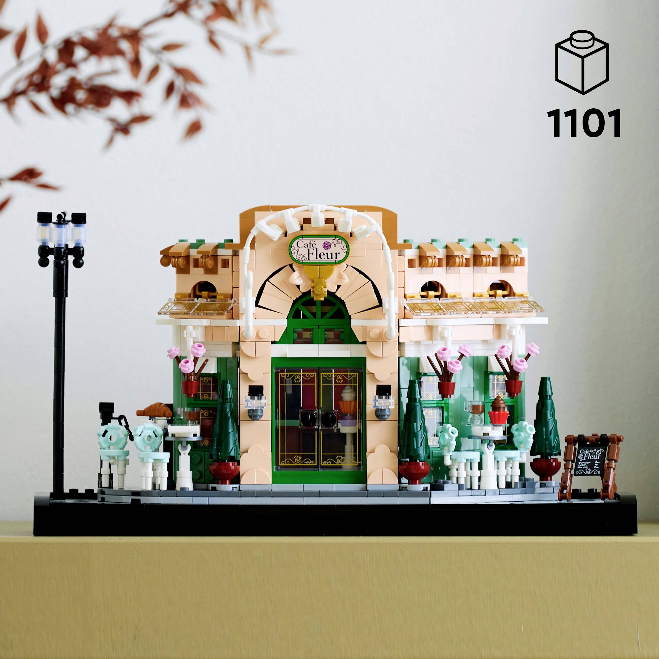 LEGO set of a small Parisian-style café with decorations and figures.