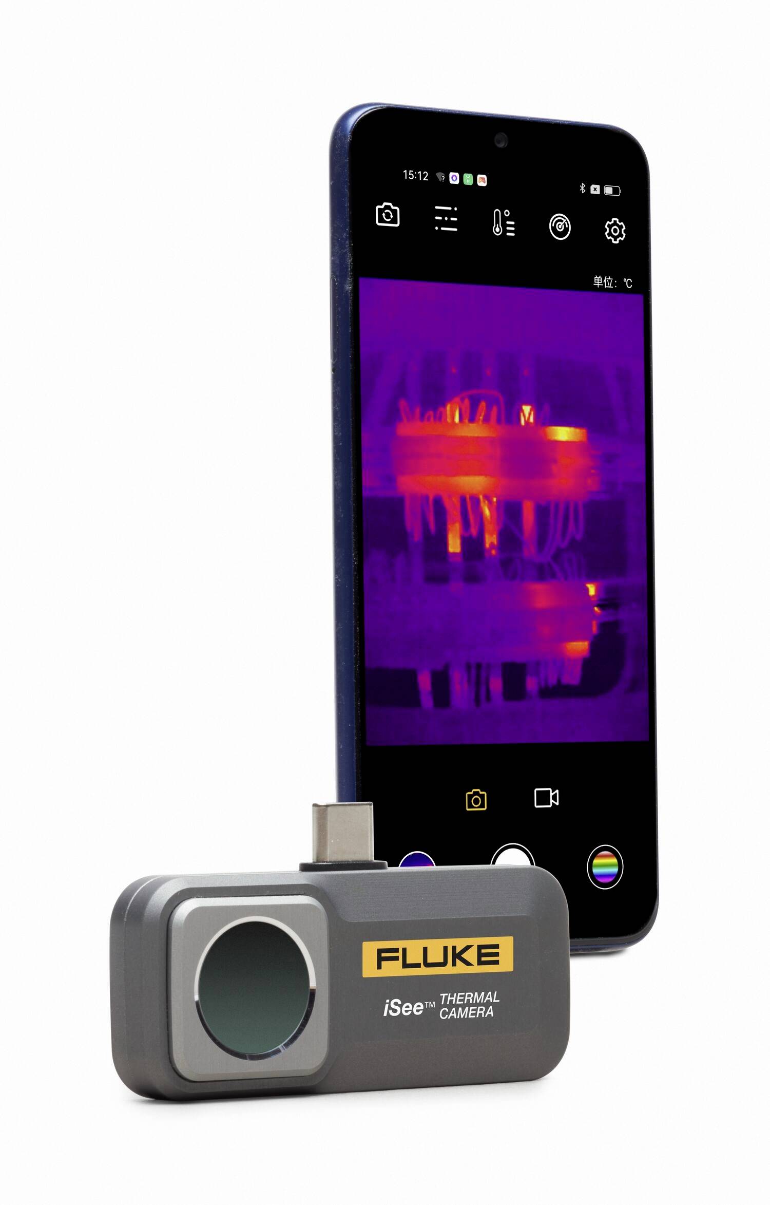 A smartphone with a thermal imaging camera attached displays a thermal image on the screen. The camera sensor is mounted at the bottom.
