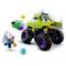 A green LEGO car with large tyres speeds along. The Hulk and another figure are suspended in the air beside the car.
