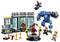 Lego building set with a superhero theme, depicting figures in armour and a workshop scene. Various accessories and robotic arms are visible.