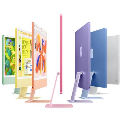 iMac computers in various colours stand in two rows facing each other. Screens display colourful designs. The focus is on the diversity of colours.