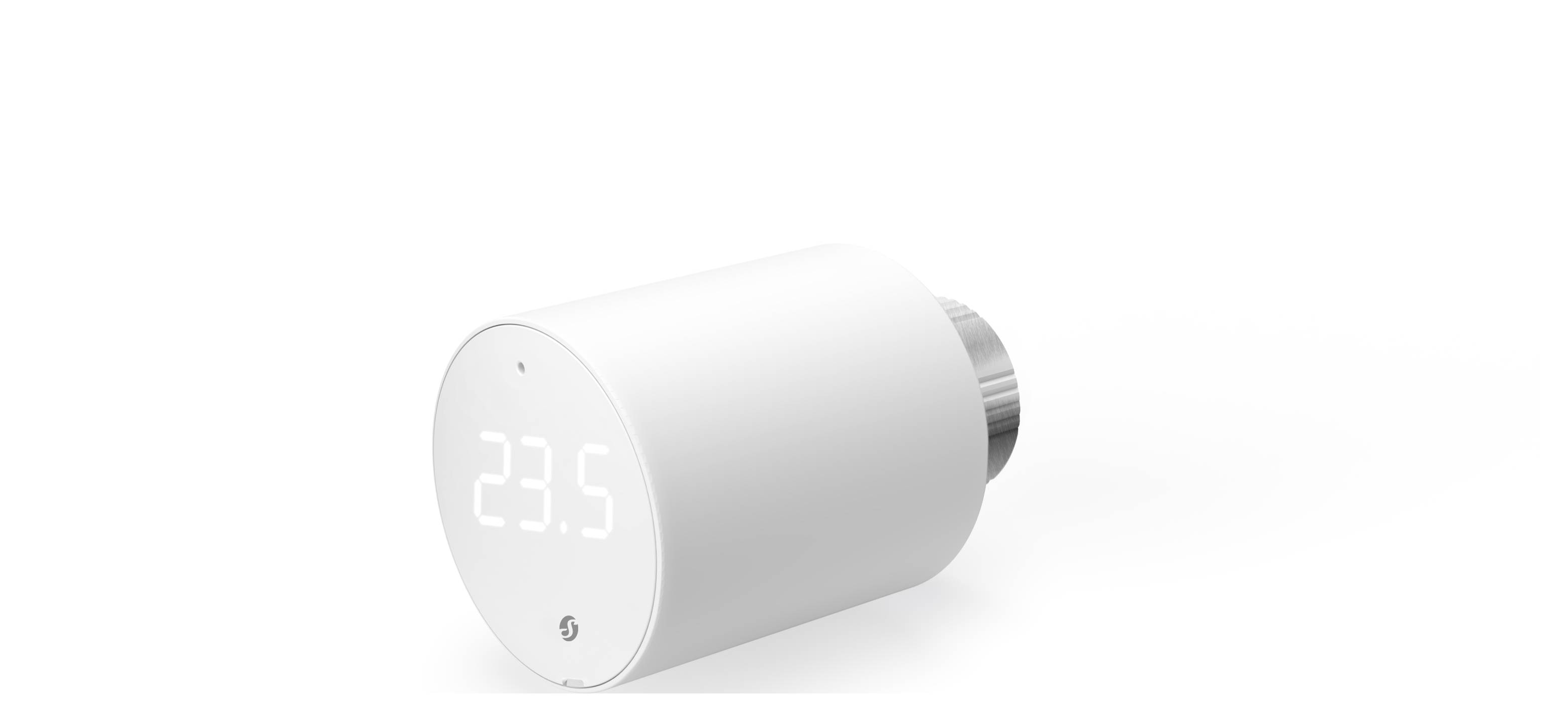 A white, cylindrical smart thermostat displays '23.5' degrees.<br><br>Note: In British English, I've kept the primary translation true to the original, with the only potential minor difference being the period placement in the decimal point for temperature.