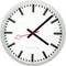 Analogue wall clock with a white dial and black markings. The hour hand points to 10, and the minute hand points to 2.