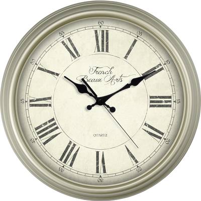 A round wall clock with Roman numerals and black hands shows 10:10. Text on the dial: 'French Beaux Arts'.