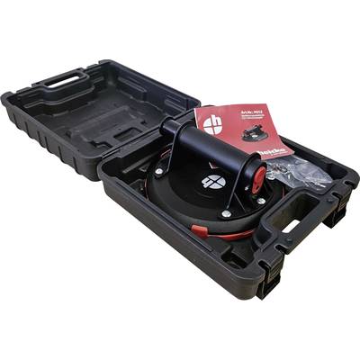 Black transport box with an open lid, containing a vacuum lifter and a red instruction manual. Packaging for hand tools.