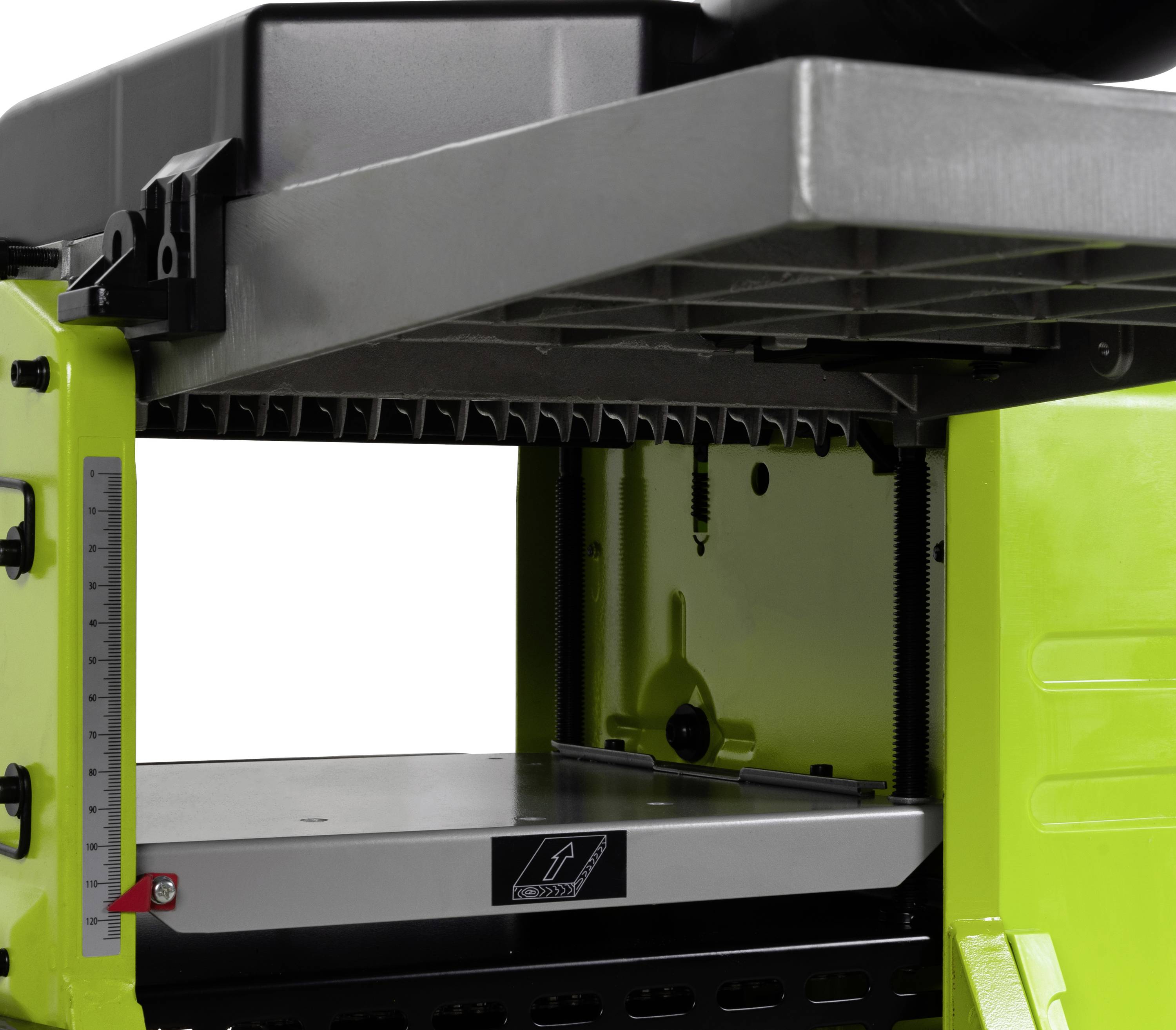 Electrical device cover with a measurement scale on the side, with a smooth metal platform underneath.