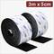 Two rolls of hook and loop fastener, black, with 3M logo. Dimensions: 3 m x 5 cm. Packaged in a plain, rectangular white box.