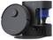 A round, grey robotic vacuum cleaner beside its charging station with a visible blue filter system.