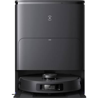 A black robotic vacuum cleaner in its charging station. The device has a simple, modern design with a smooth, rounded shape.