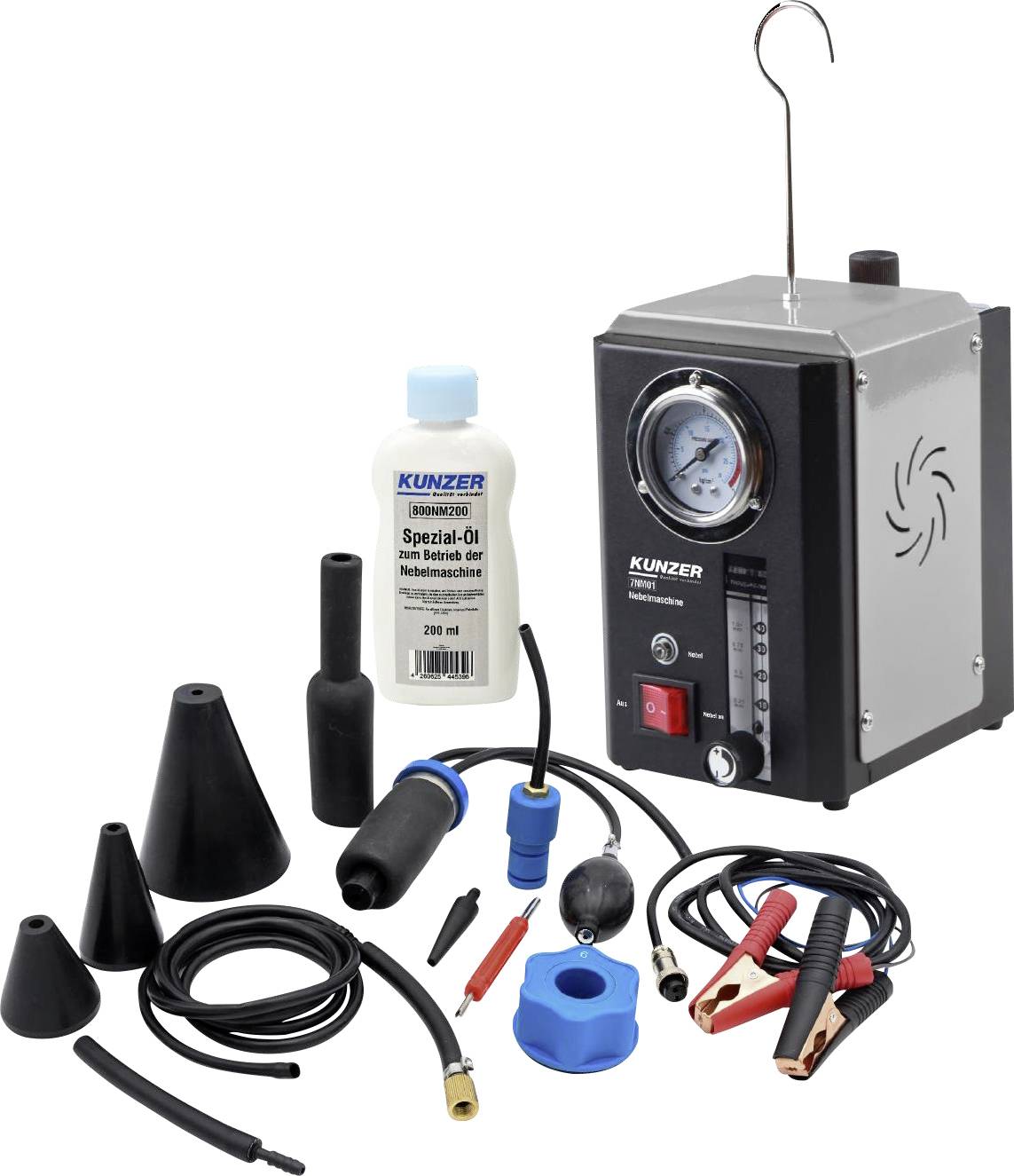 Advertisement for a vehicle smoke leak detector with accessory parts, a bottle of special oil and various hoses for detecting leaks.