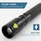 A black torch with 'Seamless Optic Focusing System' and inscription 'The New T-Series, Optimised for Professional Use'.