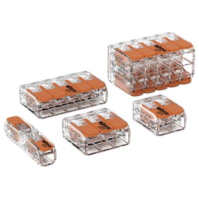 Several transparent push-wire connectors with orange levers, suitable for electrical installation requirements. Different sizes visible.