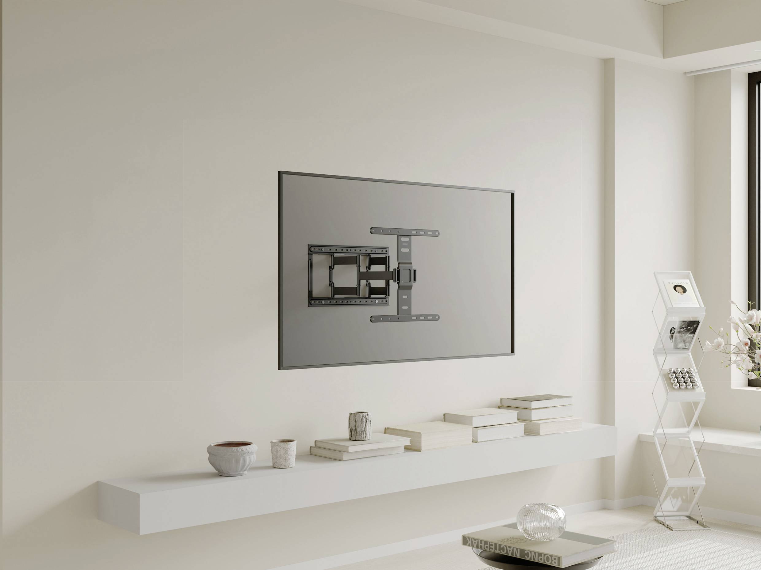 A stylish living room with neutral colours. On the wall hangs a television set not shown as activated, mounted using a complex mounting system.