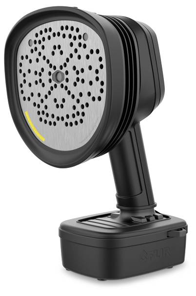 A portable device with a round, perforated head and handle. It appears designed for sensory purposes or measurement.