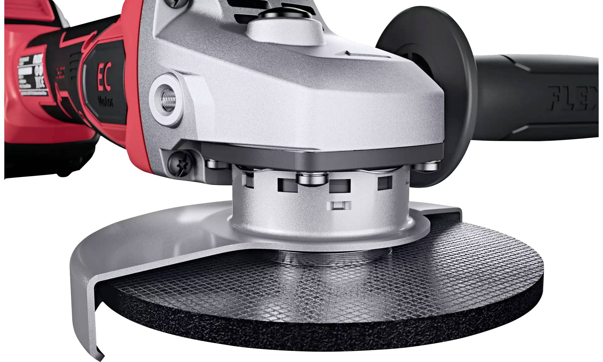 Close-up of an angle grinder with a red handle and black grinding surface, ideal for precise metal or stone processing.