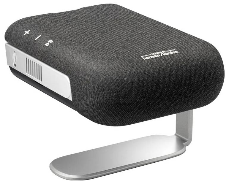 A compact, black portable projector with a silver stand. On the top are buttons for volume control and a power symbol.