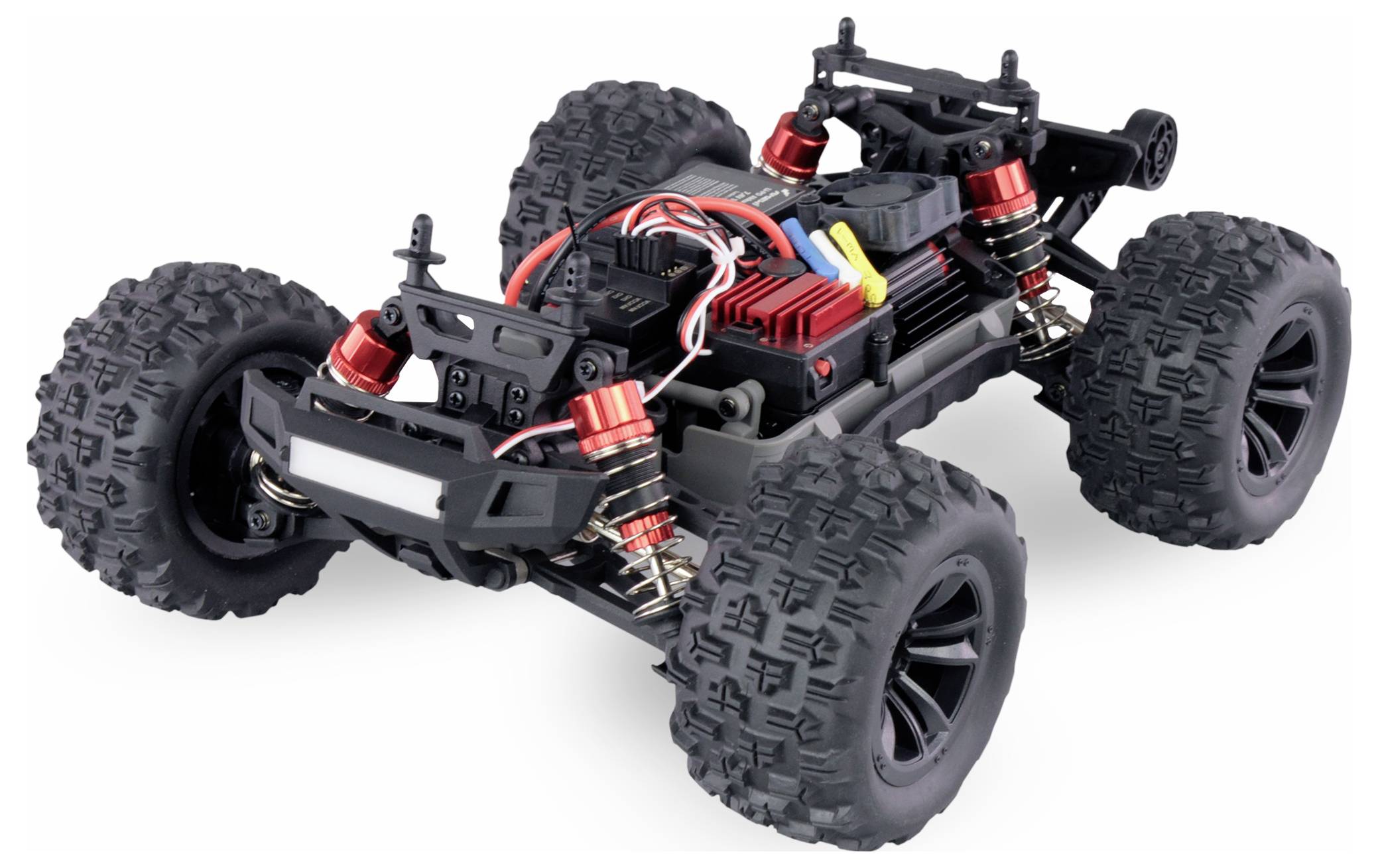 Remote-controlled car with robust tyre tread and red-black shock absorbers, suitable for challenging terrain.