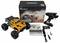 A remote-controlled car kit with an orange monster truck, remote control, battery charger, tools, and instruction manual.